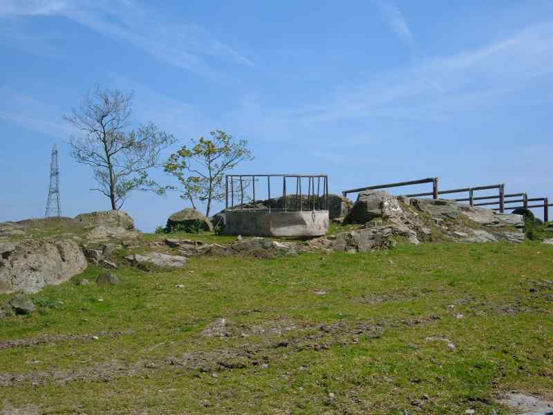Close by is this outcrop, where the farmer insists there is another burial chamber buried by farm debris